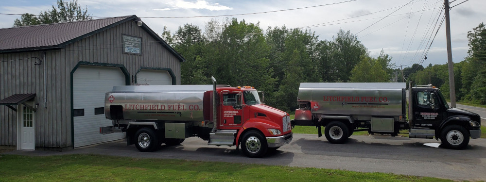 image of trucks in front of garage